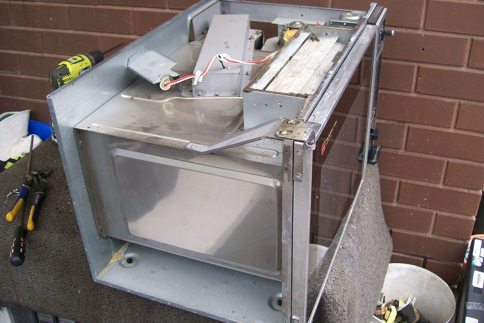 Fridge with microwave attached