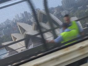 I was trying to take a pic of the Opera house while on the bus, and yeah it kinda turned out ok and wtf is with those 2 people..the bus was going so fast I cudnt even see them..