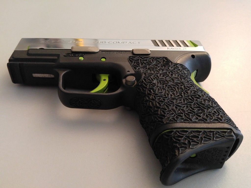 Grip Zone taken up a notch. More Cerakote. Polished Slide