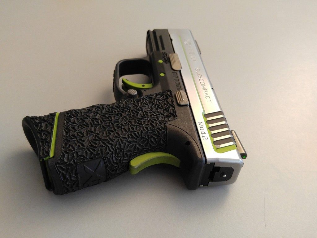 Grip Zone taken up a notch. More Cerakote. Polished Slide