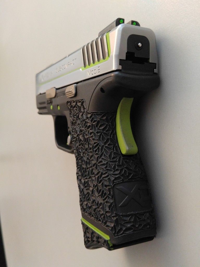 Grip Zone taken up a notch. More Cerakote. Polished Slide