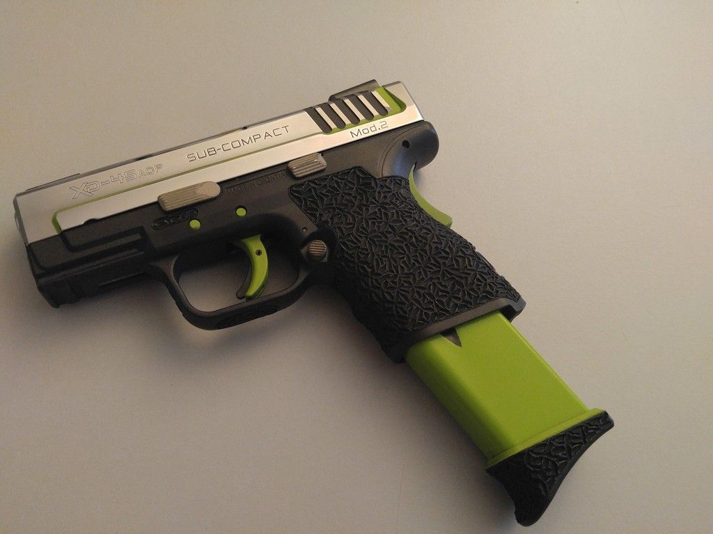 Grip Zone taken up a notch. More Cerakote. Polished Slide