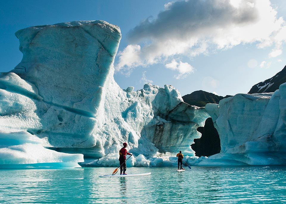 Studying ice melt via SUP on Bear Lake in Kenai Fjords National Park. © James and Courtney Forte / Aurora Open / Getty Images - Best In Travel 2018 by Lonely Planet