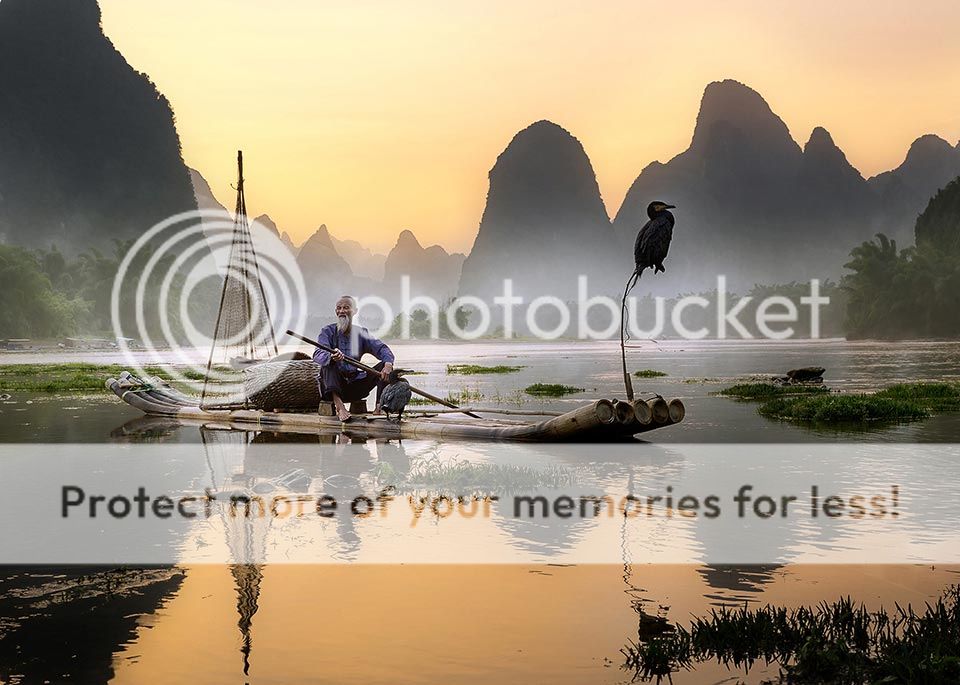 The ancient practice of cormorant fishing, where the bird catches a fish too big to swallow, can still be witnessed in some parts of China. © Pacmanfrog Photo / Moment RF / Getty Images - Best In Travel 2018 by Lonely Planet